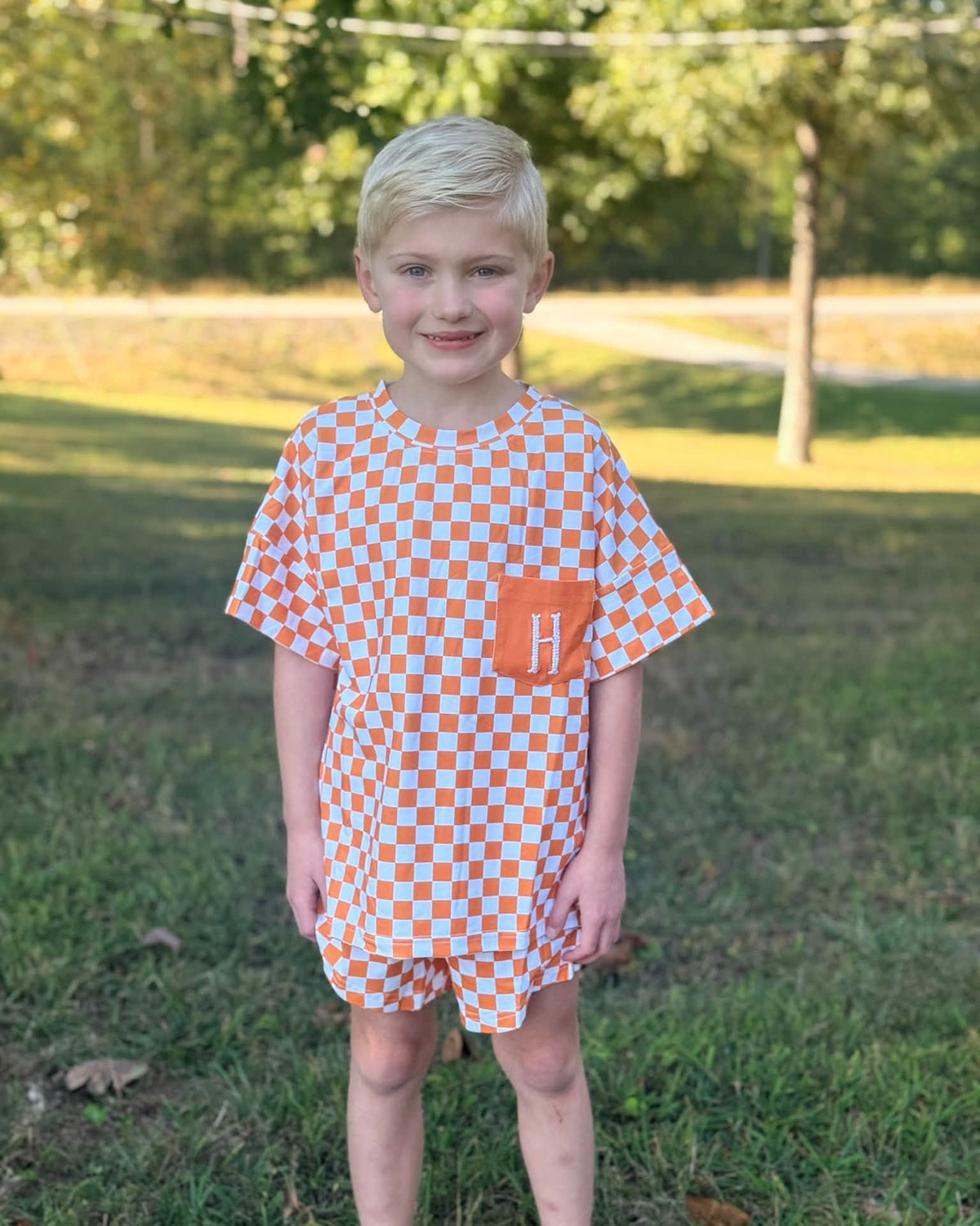 ORANGE & WHITE FOOTBALL AND BOWS BOY SHORT SET