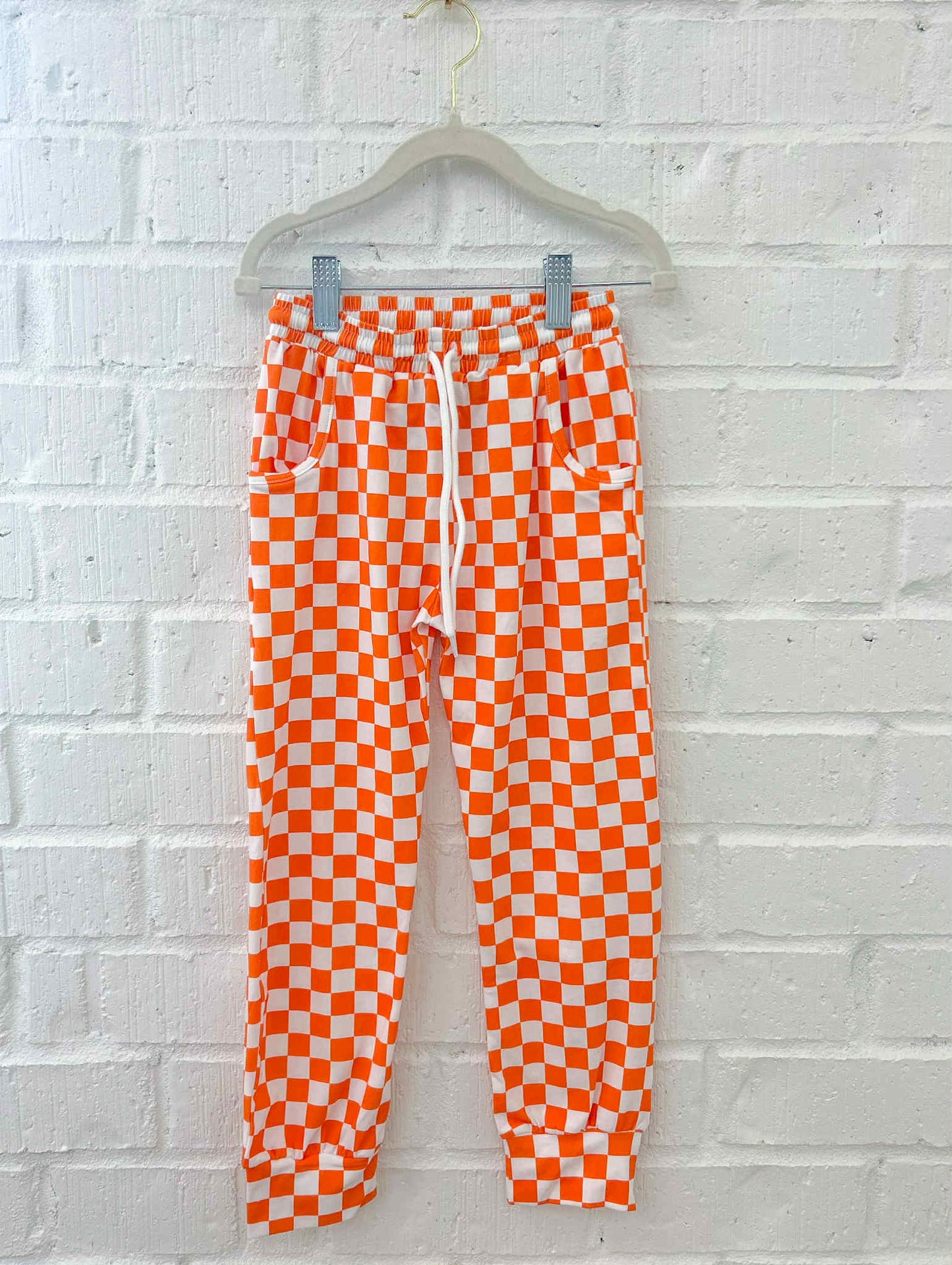 ORANGE CHECKER JOGGERS